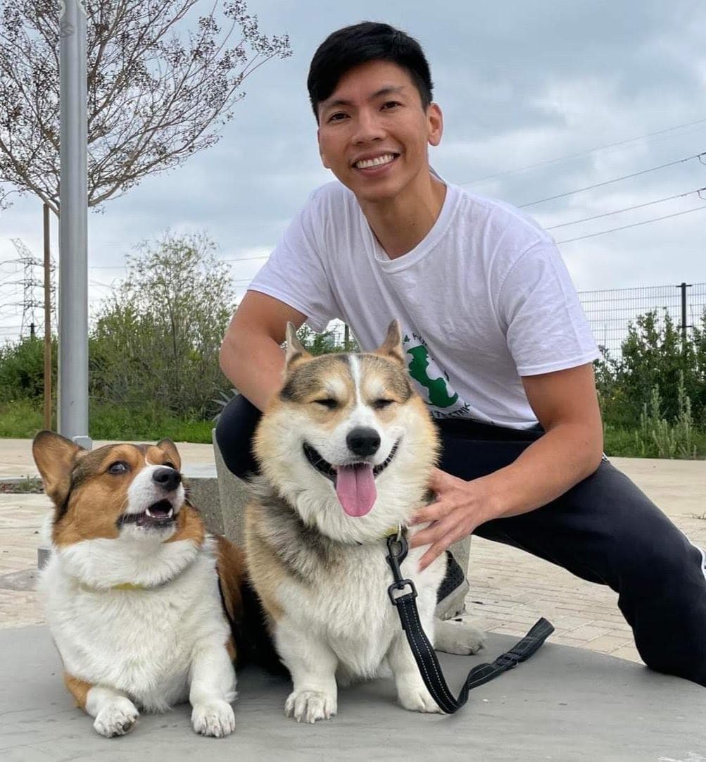 Kenneth Mejia with his two corgis.